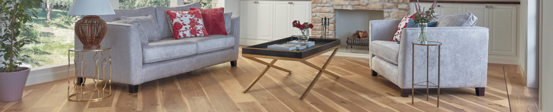 Classic Hickory EW13 floors with a DS06 10mm design strip border in a living room