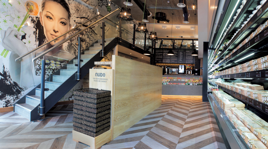 Sushi cafe with open refrigeration and an alternating chevron pattern using Grano WP311 and Ignea WP313